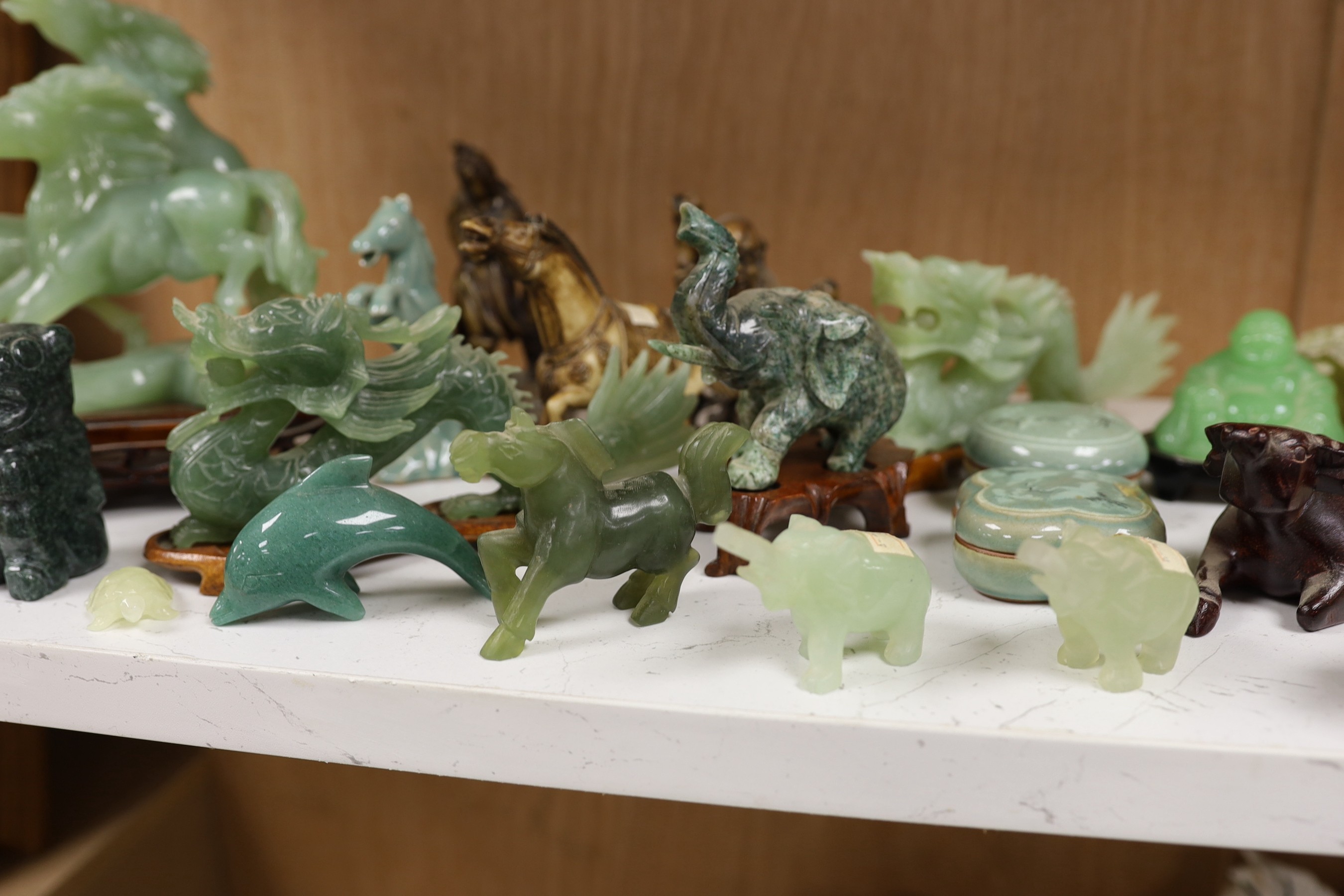 A large collection of Chinese hardstone carvings etc., The largest 19 cm high